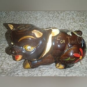 Vintage piggy bank with glass eyes
